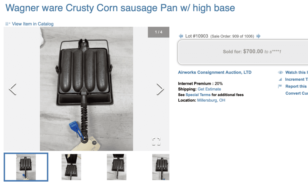 Wagner Krusty Korn Sausage Pan with patent numbers, with High Base. Sold for $700. Alaskan wire handles, bailed handle on base. 